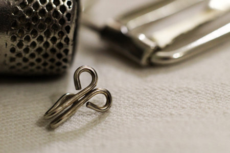 Metal sewing thimble, hook so close, macro