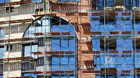 Modern facade of a building with windows reflecting the sky, objectの写真素材