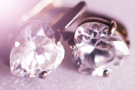 Silver earrings with diamonds so close, macroの写真素材