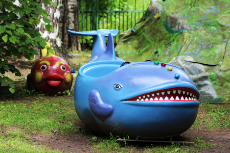 June 15, 2018. Izhevsk, Russia. Children's carousel blue whale with the Park Objectの写真素材