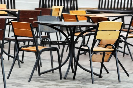 Empty coffee terrace with tables and chairs, outdoorsの写真素材