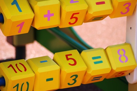 Yellow cubes with numbers and letters for children, playgroundの写真素材