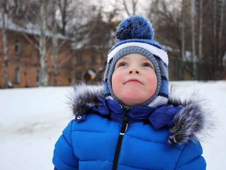 Portrait of a boy in winter so closeの写真素材
