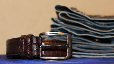Blue jeans and brown leather belt, fashion
