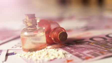 Medical bottles and blood so close, money euroの写真素材