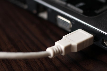 White wire in laptop usbの写真素材