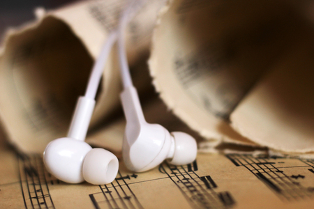 White headphones and paper old notes, retro objectの写真素材