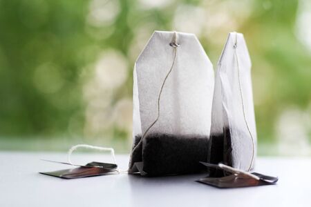 The tea bags on a nature backgroundの写真素材