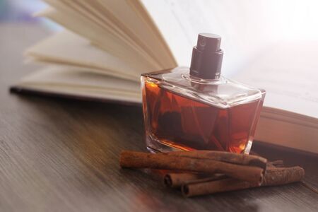 Brown women's perfume among the shellsの写真素材