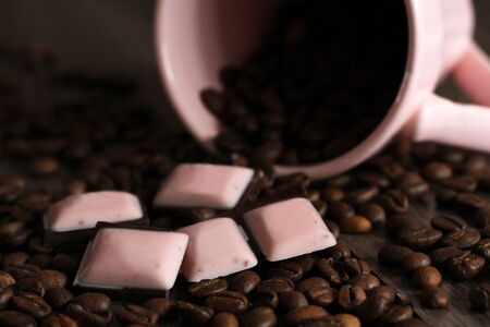 Pieces of dark chokolate and coffee beansの写真素材