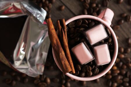 Pieces of dark chokolate and coffee beansの写真素材