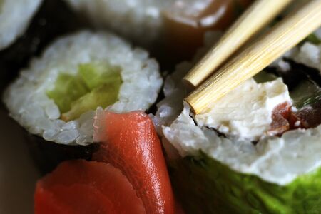 Delicious rice and fish rolls. Traditional Japanese cuisine. So close.の写真素材