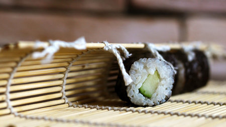 Delicious rice and fish rolls. Traditional Japanese cuisine. So close.