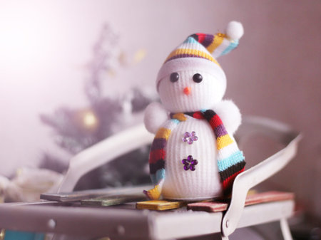Christmas snowman toy close up with scarf, a gift