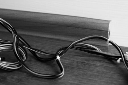 Floor plinth and electric cable, repair and design houseの写真素材