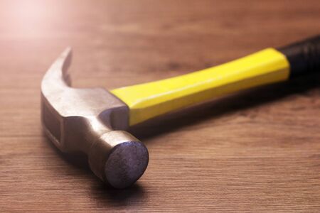 Yellow hammer, a tool for construction and repair, so closeの写真素材
