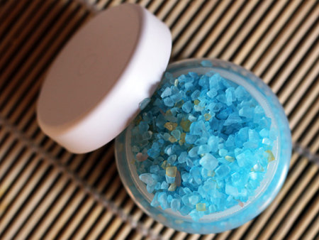 bowl with a blue bath salt so closeの写真素材