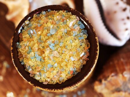 seashell and colored sea salt so closeの写真素材