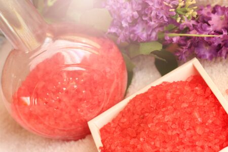 Red sea salt and purple flowers, beauty and health, styleの写真素材