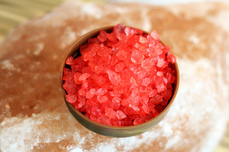 Red sea salt and purple flowers, beauty and health, styleの写真素材