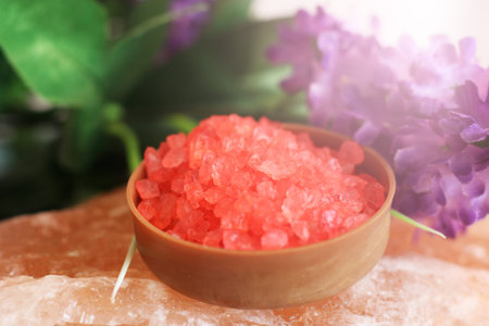 Red sea salt and purple flowers, beauty and health, styleの写真素材