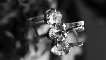 Silver earrings with fianite, black and white imageの写真素材