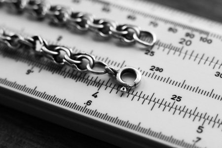 Silver chain on the measuring device.