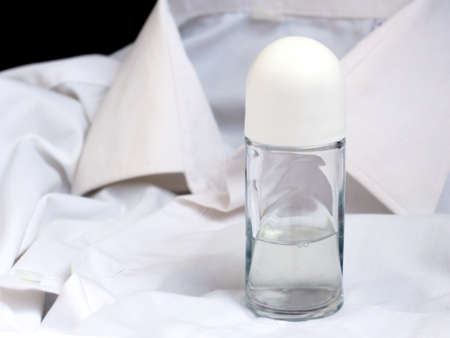 deodorant with cup isolated on a white textile so closeの写真素材