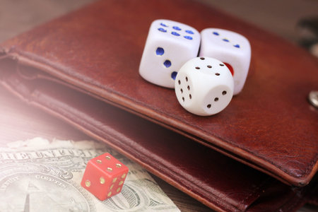 US dollars and playing dice so close