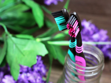 Toothbrush with beautiful flowers. Healthcare object.