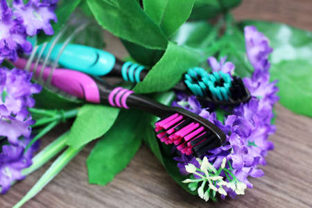 Toothbrush with beautiful flowers. Healthcare object.の写真素材