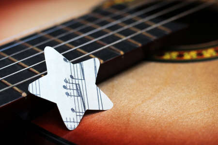 September 1, 2020. Izhevsk, Russia. A guitar with paper stars notes so close. Idea.の写真素材