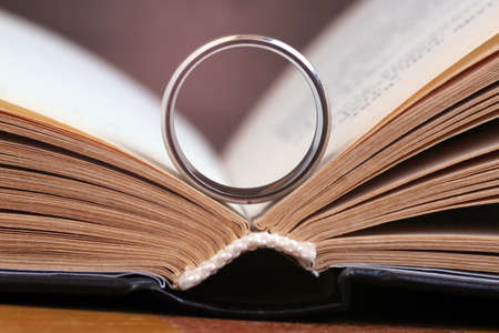Golden ring and a book so close, macroの写真素材