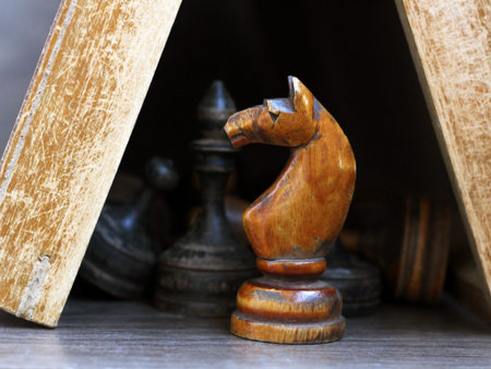 Wooden chess pieces on a chess board, retro gameの写真素材