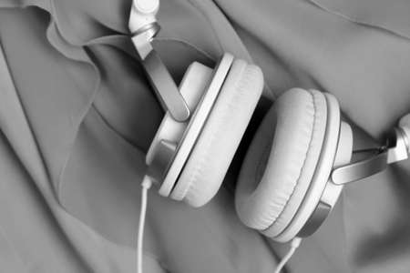 White headphones so close, black and white image, musicの写真素材