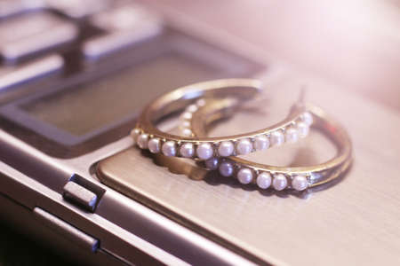 Tools of jewelery. Beautiful earrings. Fashion object.の写真素材
