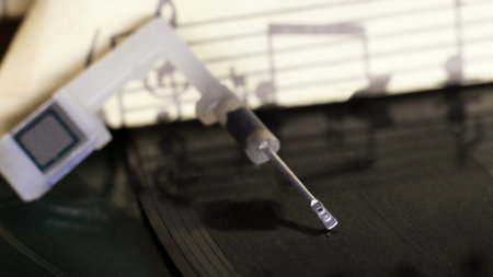 Needle for old-fashioned record player and vinyl, macro music objectの写真素材