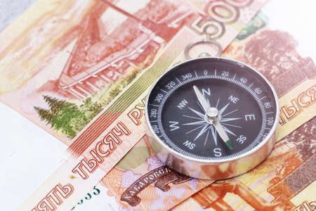 Compass and five thousand rubles bills, travelの写真素材