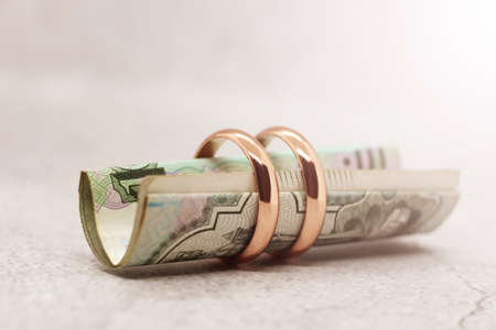 Wedding rings and russian money, married financeの写真素材