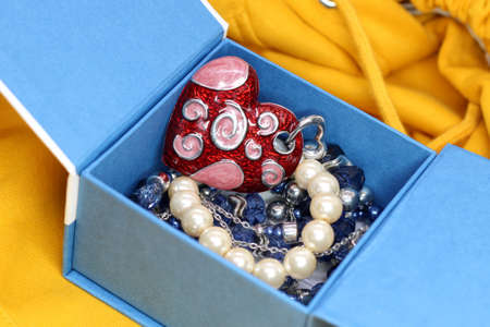 Fine art photo of exclusive jewelry set so close, red heartの写真素材