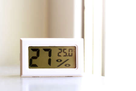 Device for measuring temperature and humidity on the windowsillの写真素材