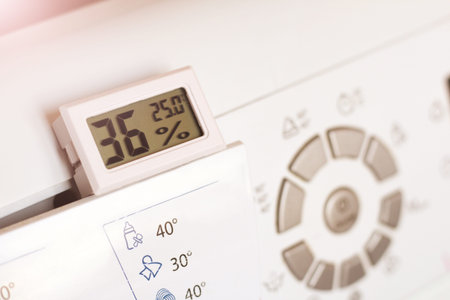 Washing machine and thermometer with temperature and humidity indicationの写真素材