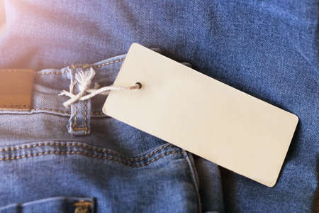 blue jeans with price tag top viewの写真素材