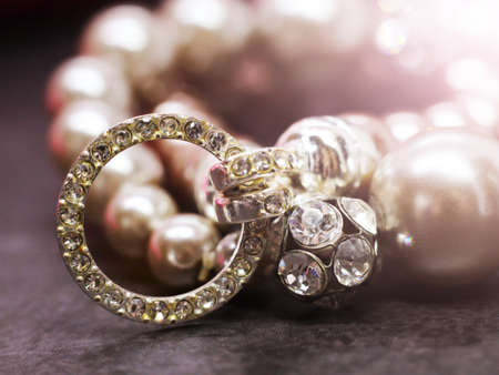 A bracelet made of beads and diamonds, a gift for a girlの写真素材