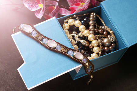A set of women's jewelry, bracelets made of stones and beadsの写真素材
