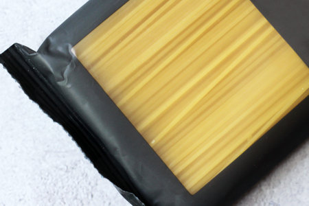 Dry spaghetti in a package, top viewの写真素材