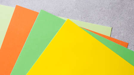 Office colored paperon gray backgroundの写真素材