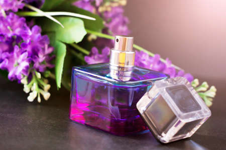 Women's pink-lilac perfume and flower bouquetsの写真素材