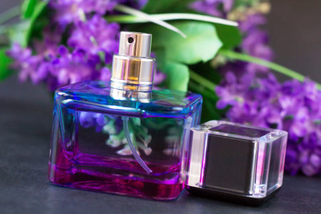 Women's pink-lilac perfume and flower bouquetsの写真素材