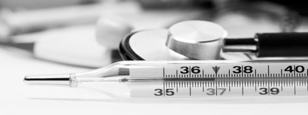 Mercury thermometer and stethoscope, medical instruments